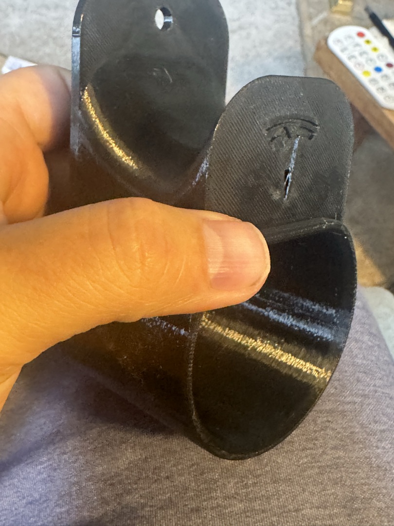 Tesla charger holder installed